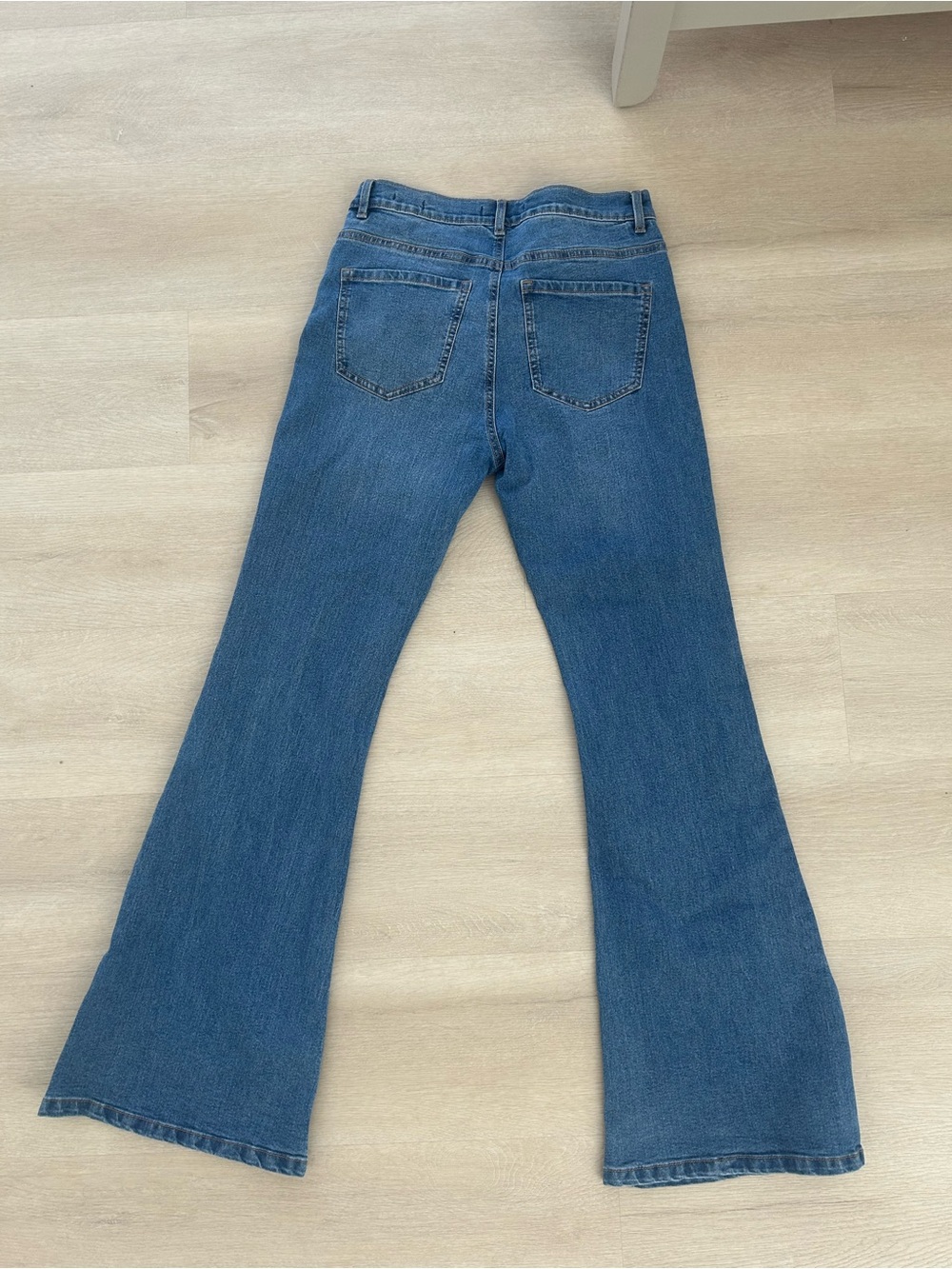 High-Rise Flared Women's Jeans in Medium Blue - Picture 7 of 8